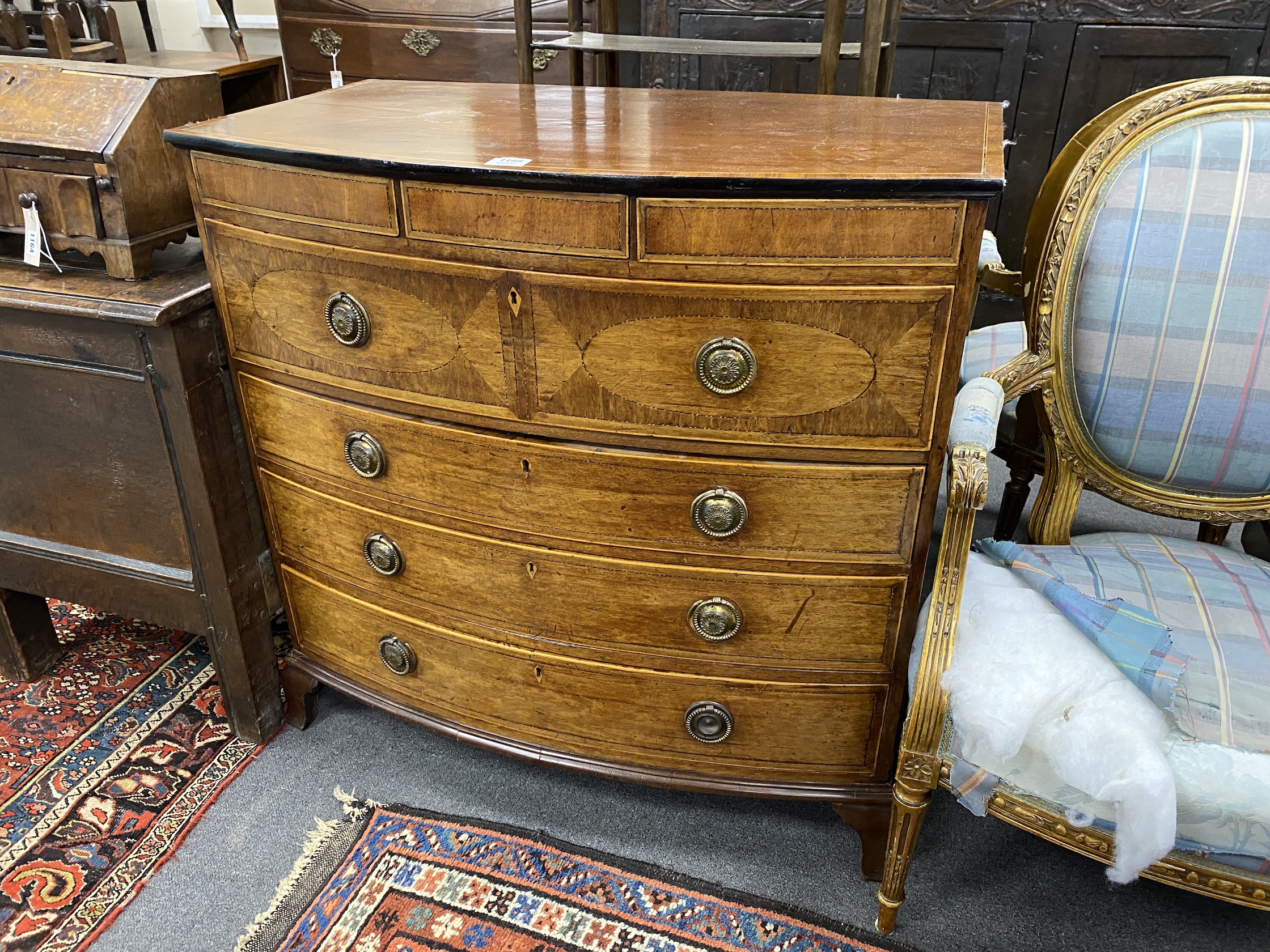 A Regency banded mahogany bowfront secretaire chest, width 94cm, depth 53cm, height 92cm